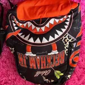 Sprayground Black and Orange Kids Backpack
